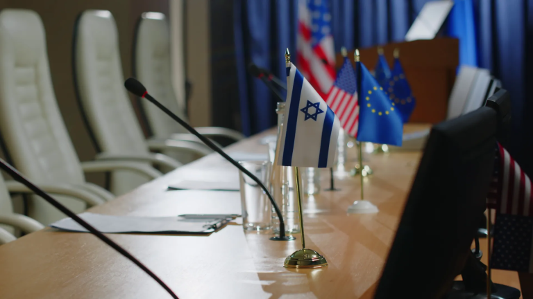 National Flags Of Israel Usa And European Union On Press Conference Table